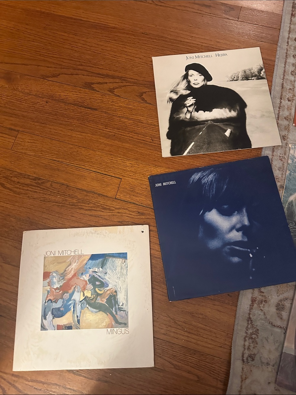 Lot of Joni Mitchell records blue Mingus for the roses wild things
